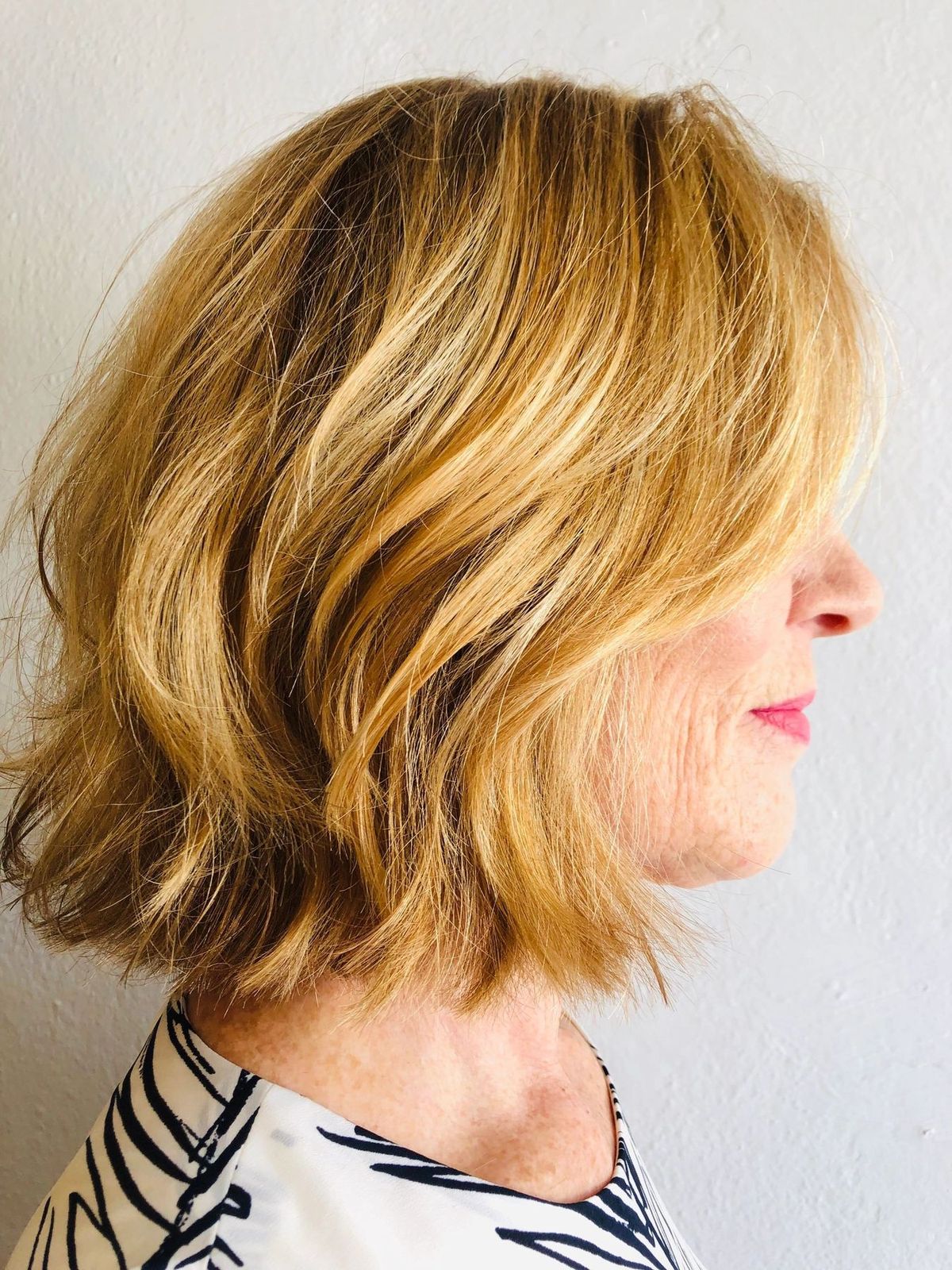 So in for fall: a layered bob, strawberry blonde with dark copper lowlights.